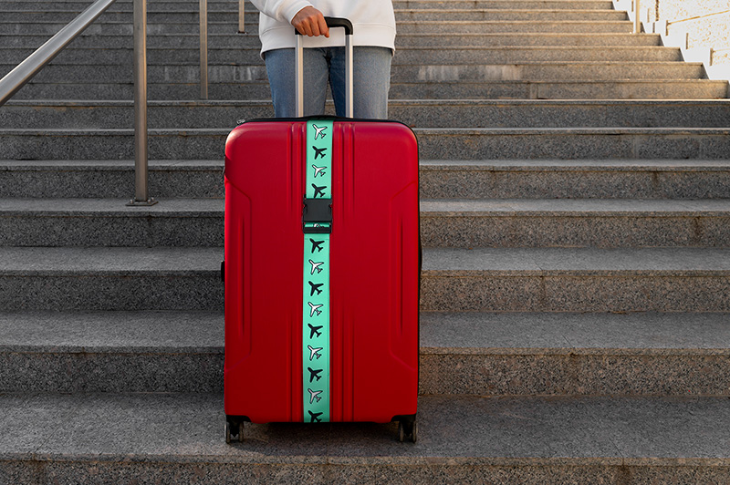 Pas zabezpieczający do walizki - Turkusowy w samoloty