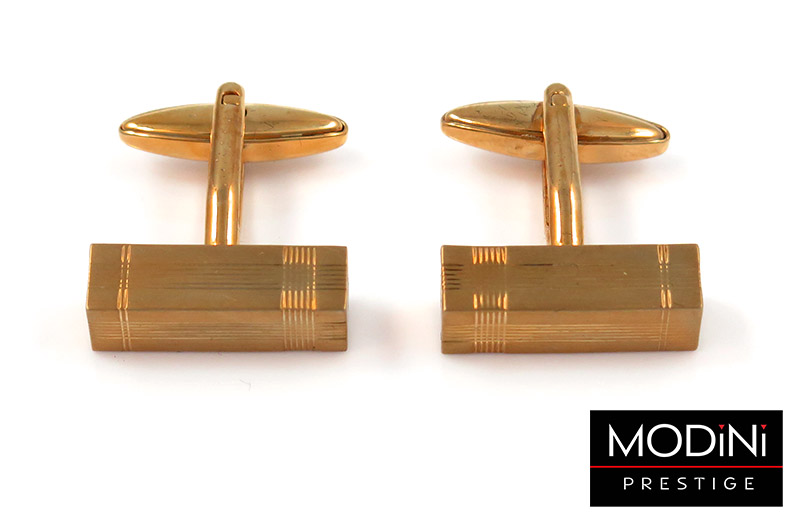 Złote spinki na guziki z drobnymi liniami